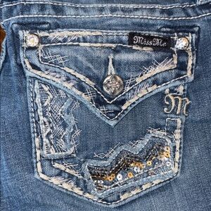 Miss Me 30x34 relaxed boot  There are wear marks on the back of the legs.